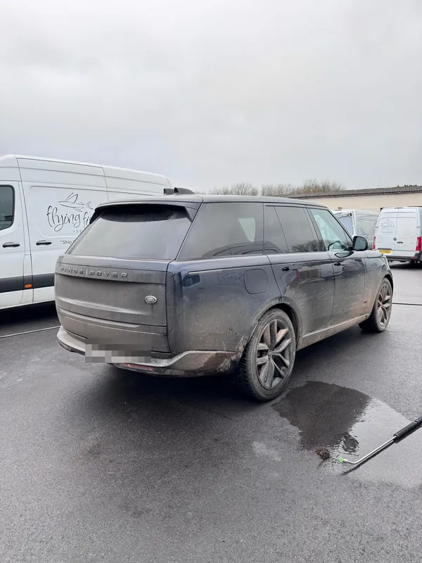 Range Rover before exterior valet — muddy paintwork